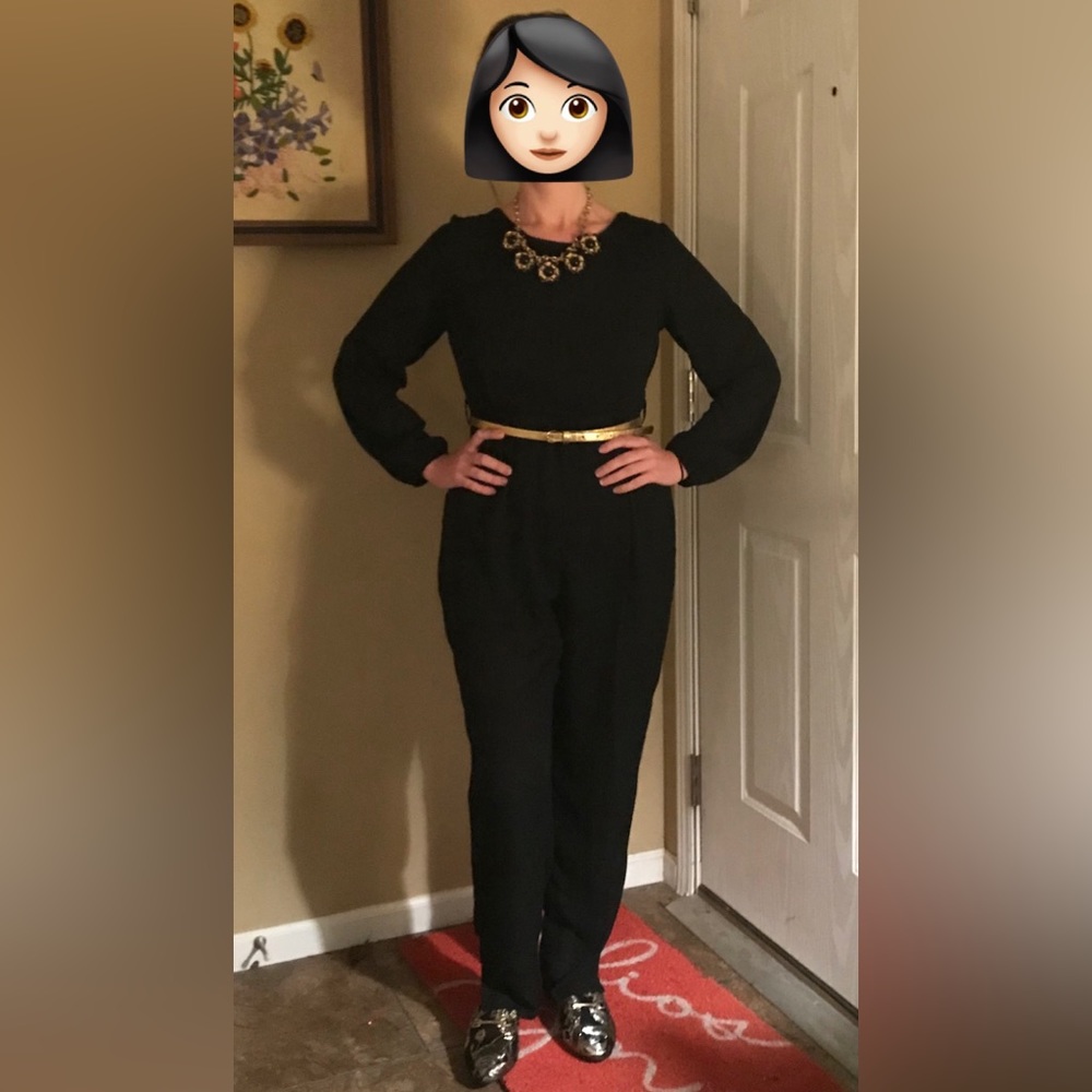 Black jumpsuit with lace back.